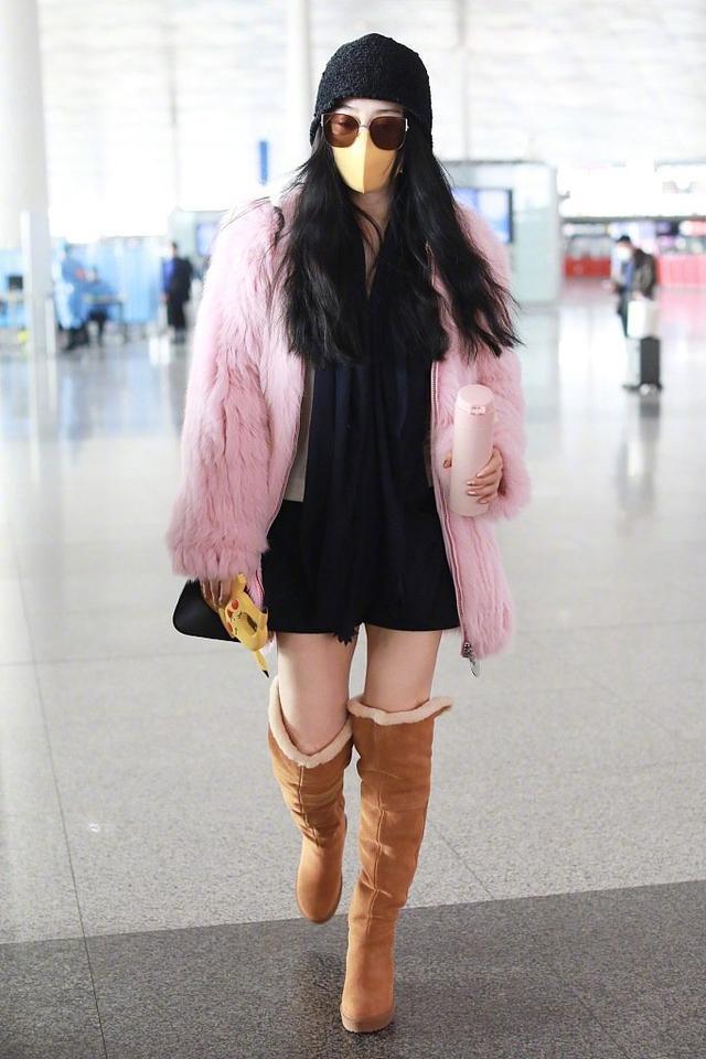 Fan Bingbing's latest airport Reuters, wearing pink fur with snow boots ...