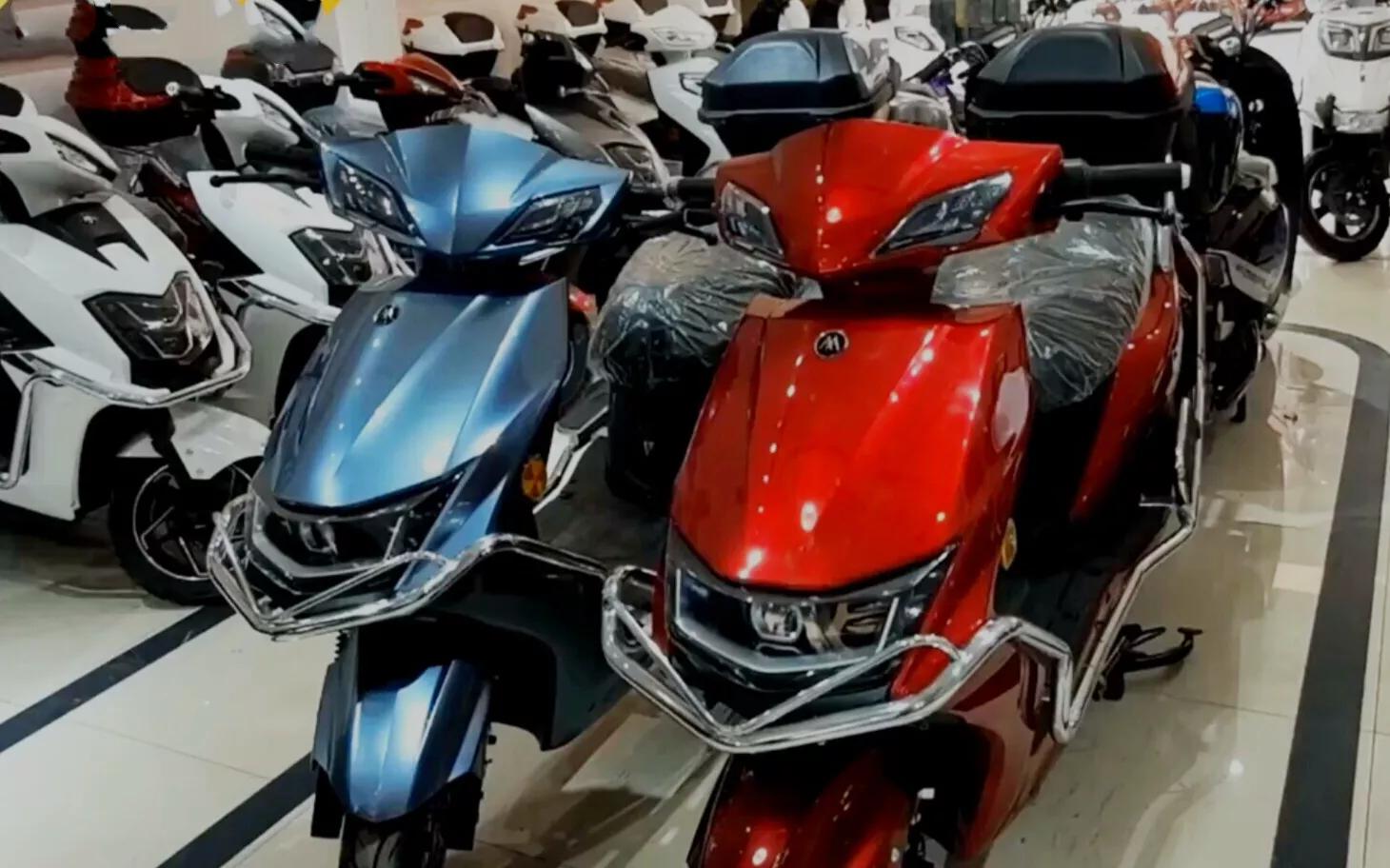 Emma's two electric motorcycles are very costeffective. Do you like