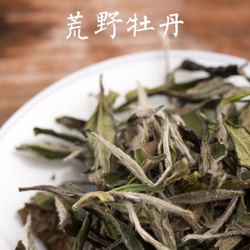 How to drink white tea cakes?The first step is to pry tea iNEWS