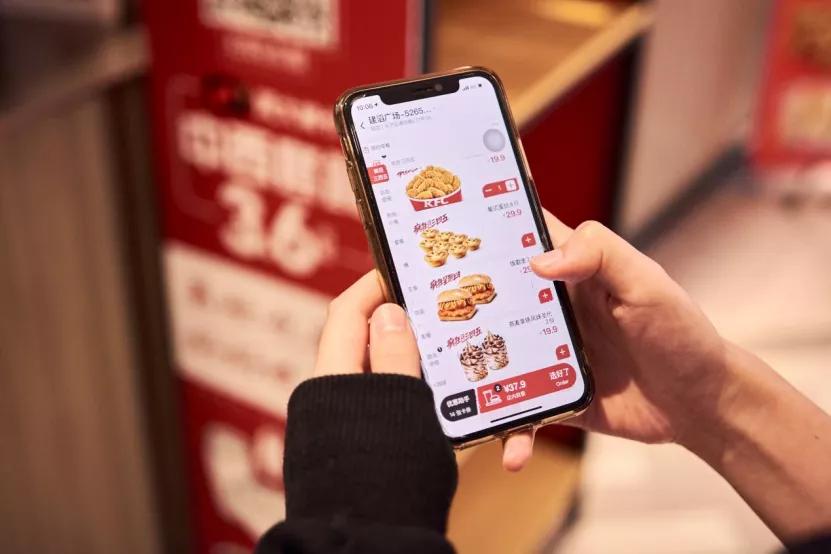 How does KFC use digitalization to create a 