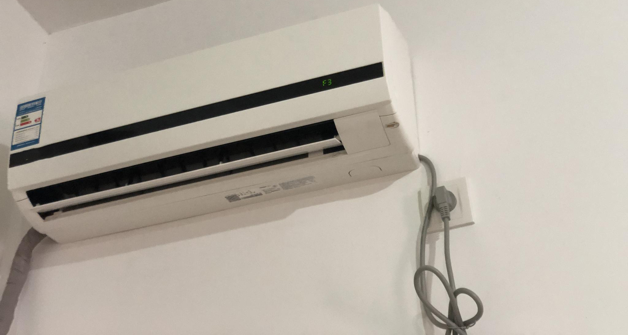 Should I unplug the air conditioner if the plug is not turned on in