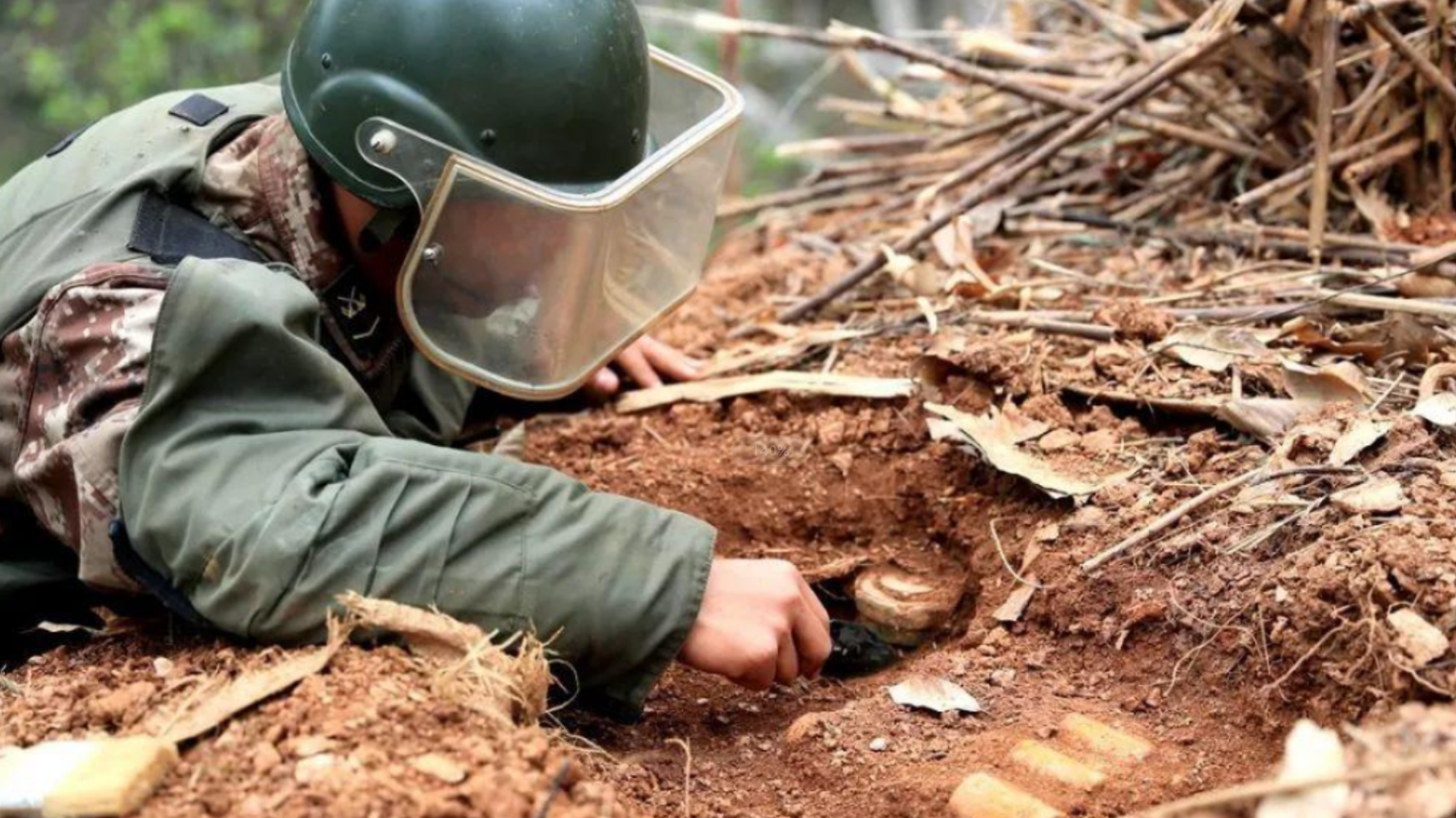 If I cover the grenade with a helmet, can I survive the explosion? The