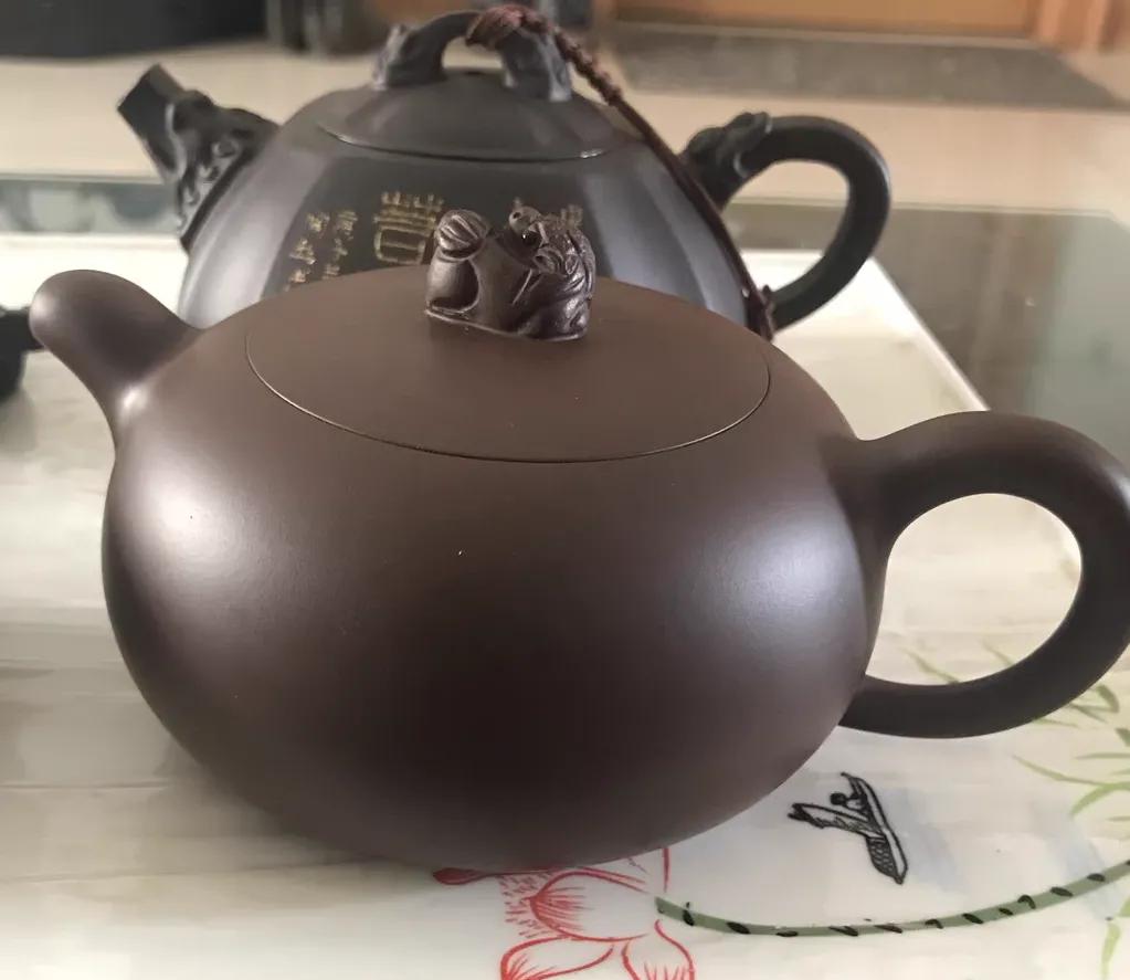 Purple clay teapot is both artistic and practical iNEWS