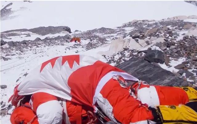 A corpse at 8,500 meters from Mount Everest, wearing green shoes and ...