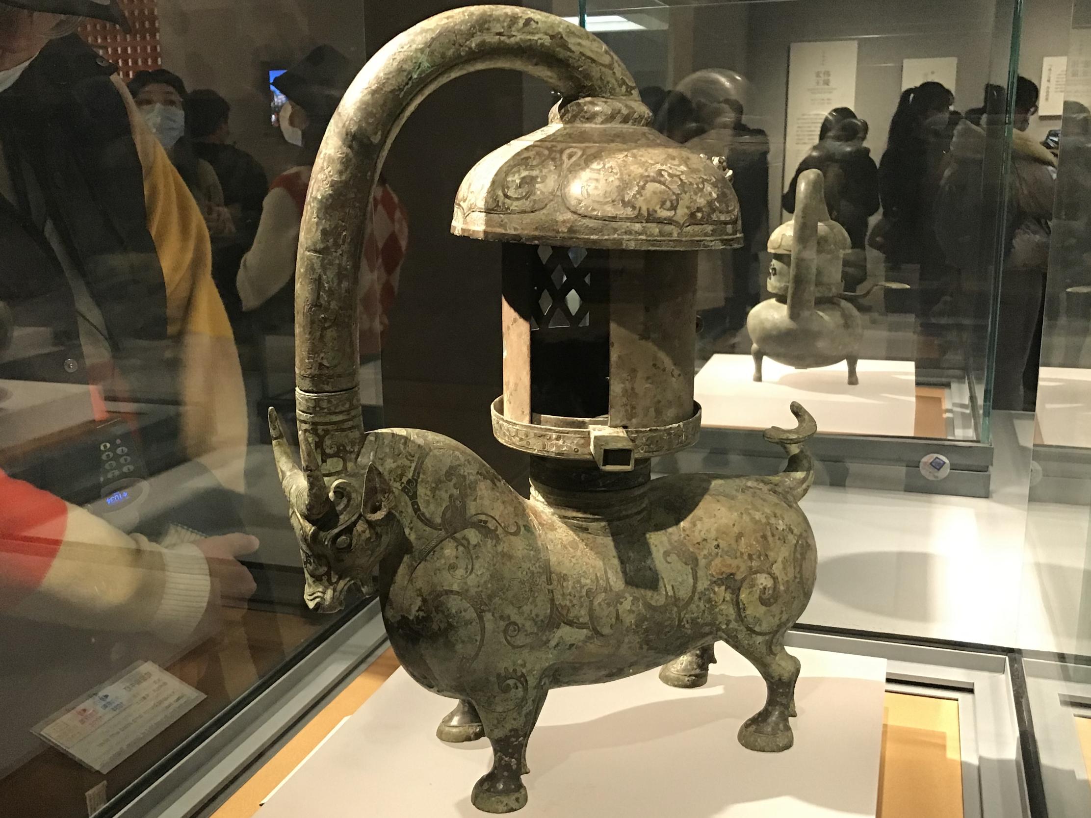 The Eastern Han Dynasty silver copper bull lamp, now in the collection ...