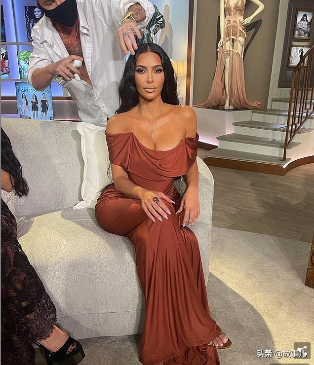 princess polly baby blue dress Kim Kardashian's London Outfit: Slip Dress Paired with Bold Burgundy Boots