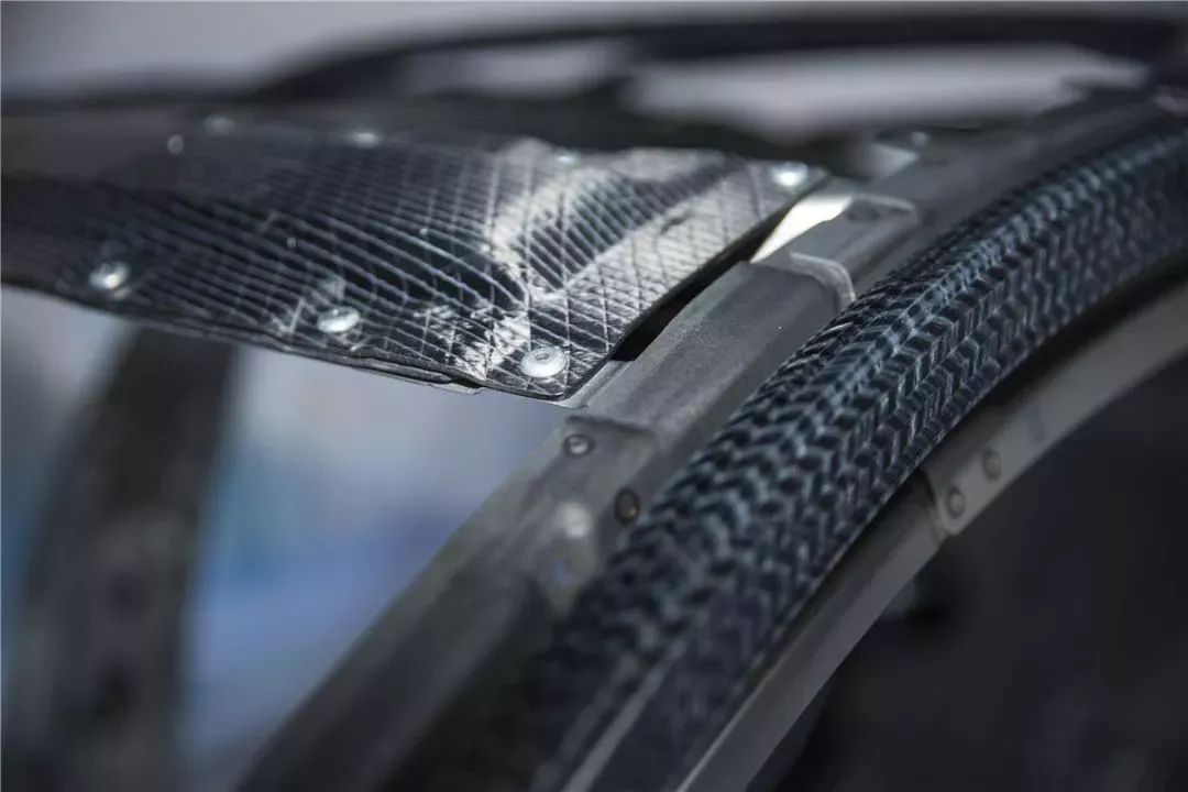 Less than half the weight, but far stronger than steel, is carbon fiber